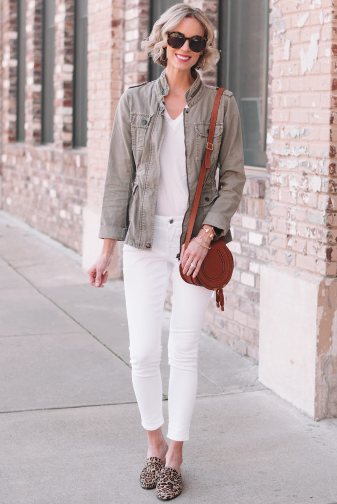 all white outfit with utility jacket and white jeans