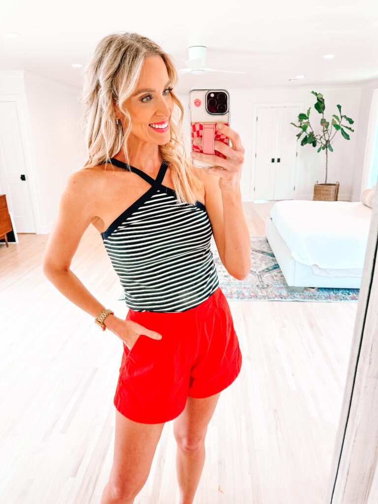 I'm sharing six mix and match affordable 4th of July outfits. Everything is true to size and can be worn at other times throughout the year. I love the neckline on this halter striped top paired with red shorts. 