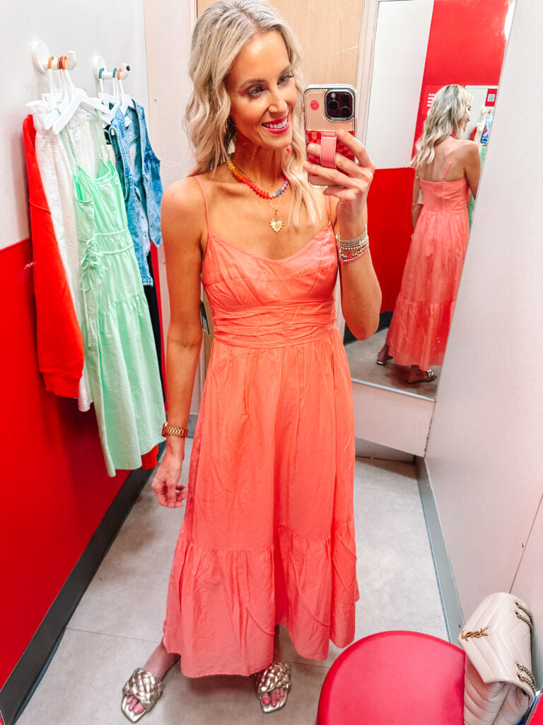 I love the flattering fit of this coral maxi dress!