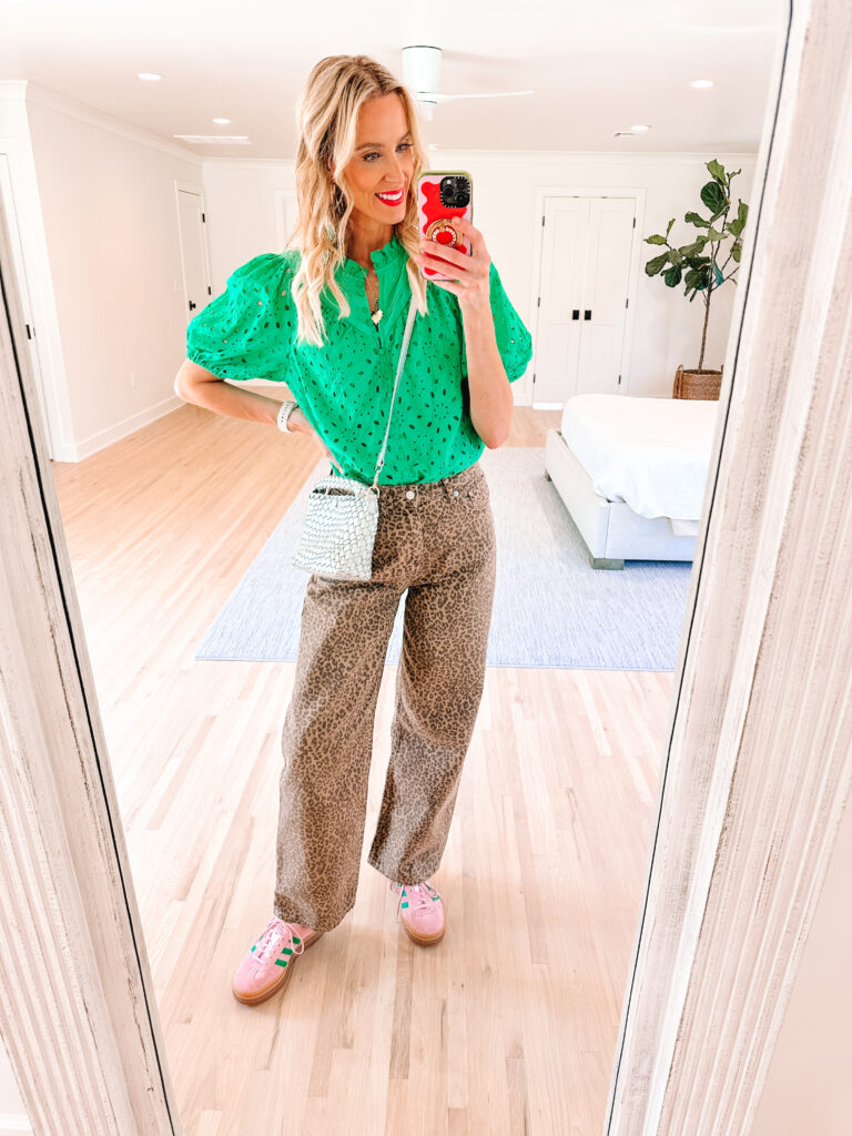 Leopard dresses, pants, tops, shoes, and more are all over. Today I am sharing how to wear leopard jeans including 5 different ways to style them. Try a bold color like a green blouse. 