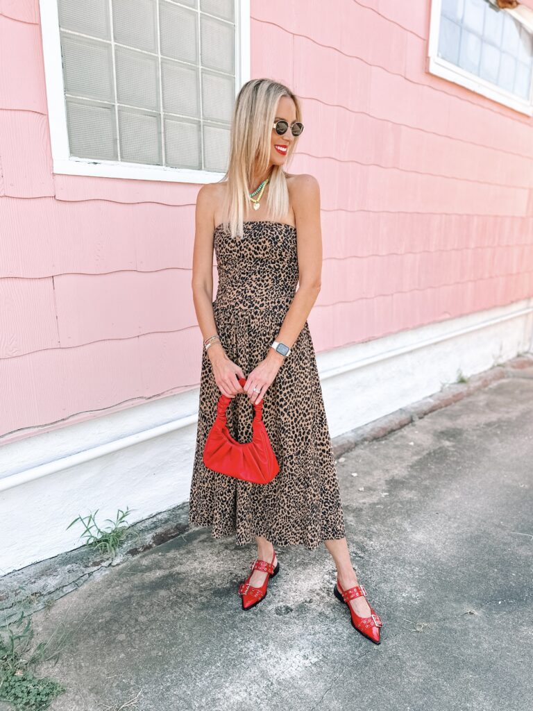 You will love this affordable Target leopard dress. It's sleeveless with a drop waist and so on trend! Pair with red accents. 